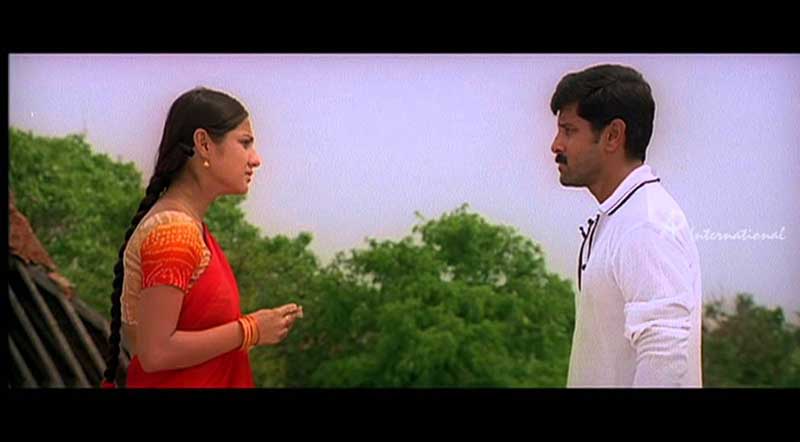 Megathil Ondrai Song Lyrics